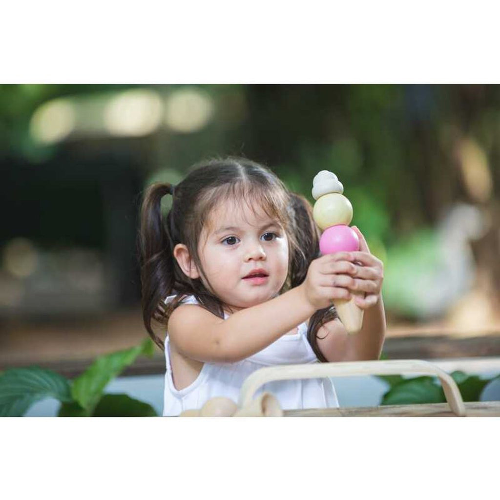 Kid playing PlanToys Ice Cream Set