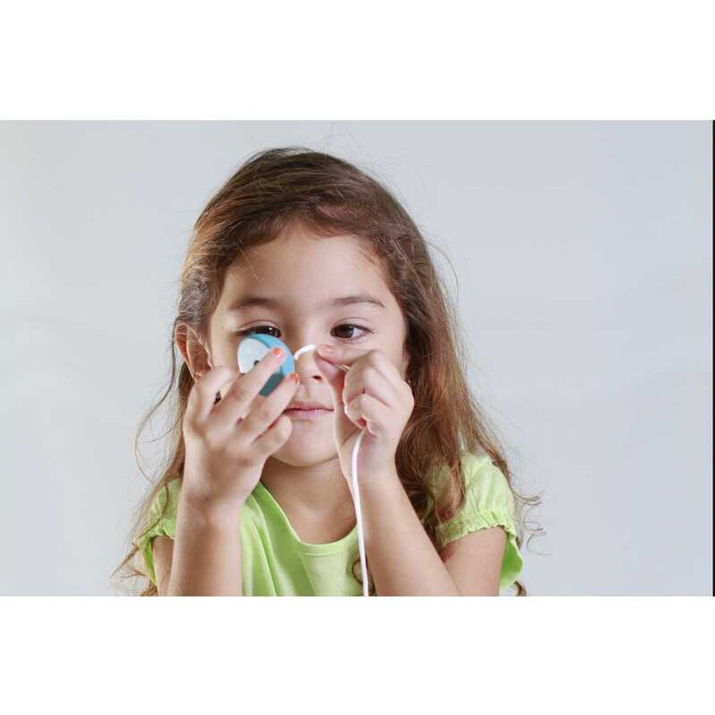 Kid playing PlanToys Lacing Beads