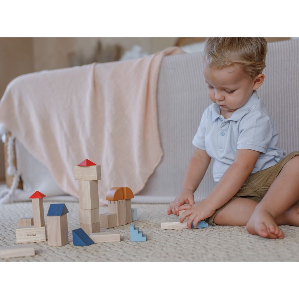 Kid playing PlanToys Creative Blocks - Orchard Series